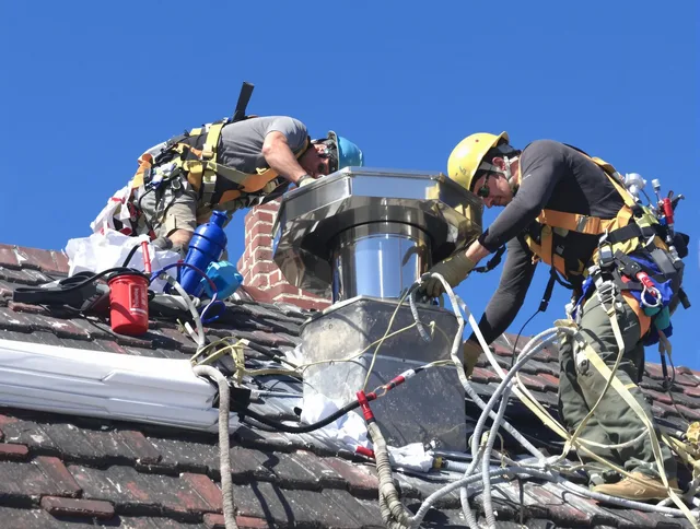 Protective chimney cap installed by Indian Trail Chimney Sweep in Indian Trail, NC
