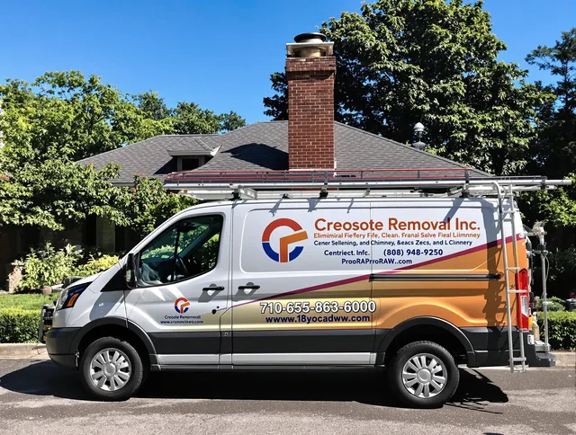 Indian Trail Chimney Sweep technician removing creosote safely in Indian Trail, NC